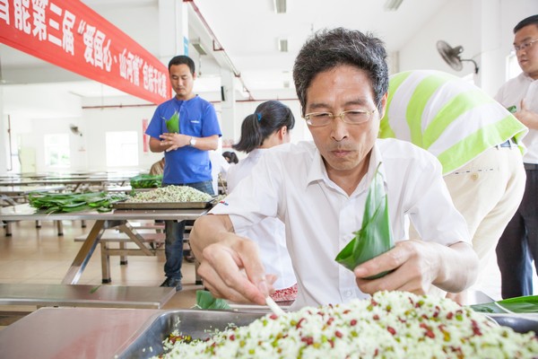 弘扬传统文化，共享浓情端午——记第三届“爱国心·江山情”包粽子角逐